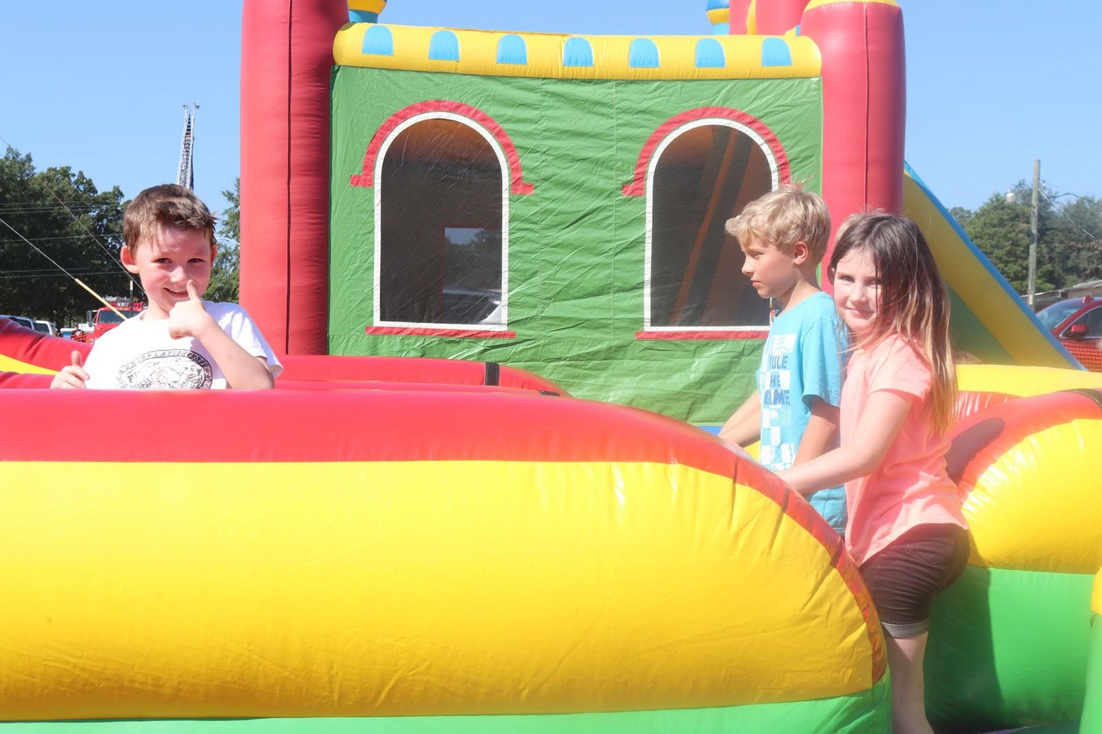 Kids playing in a bounce house